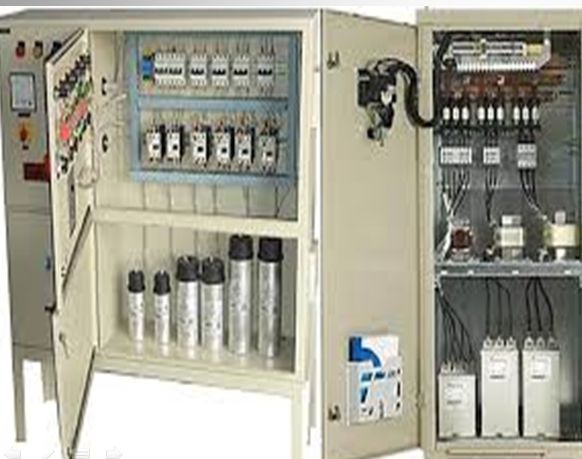 APFC capacitor panel with doors open showing capacitor stages